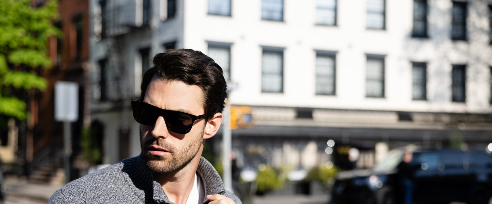 Man wearing designer sunglasses on a New York City street