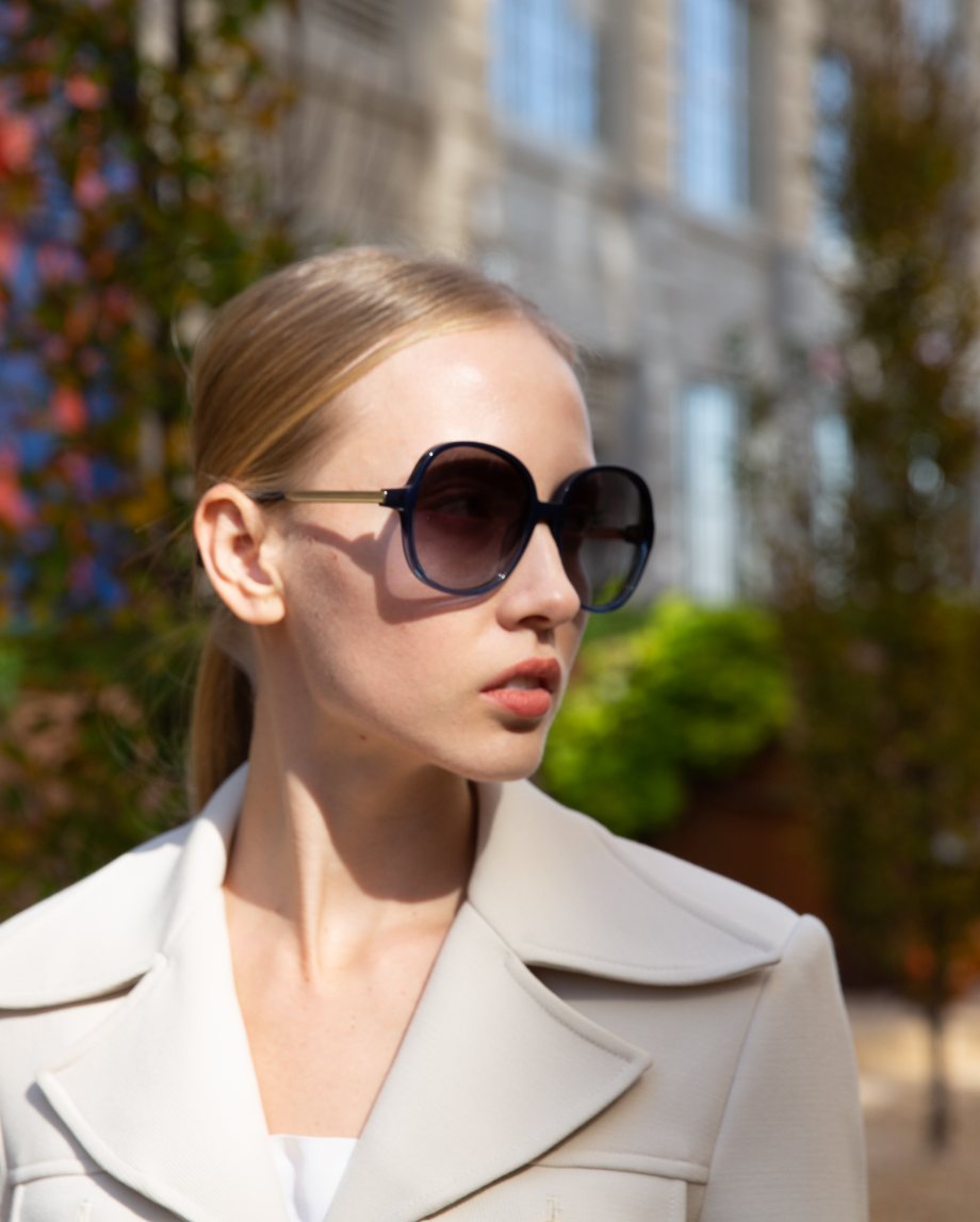 Customer wearing designer eyewear on a city street