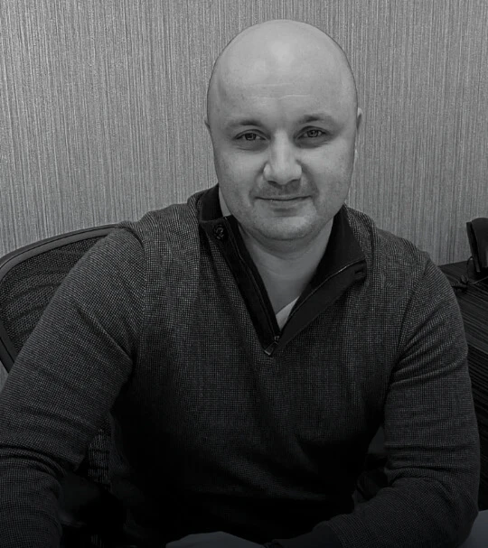 Aleksandr, CEO and Co-founder of NYWD in his office